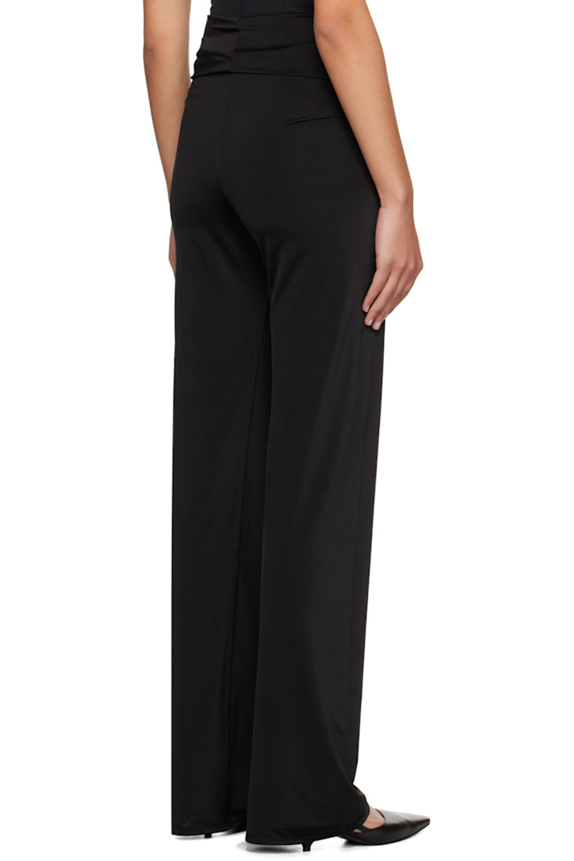 Stretch polyester jersey trousers. 

· Draping, gathering, and twisted detailing at waistband 
· Full jersey lining

Supplier color: Black