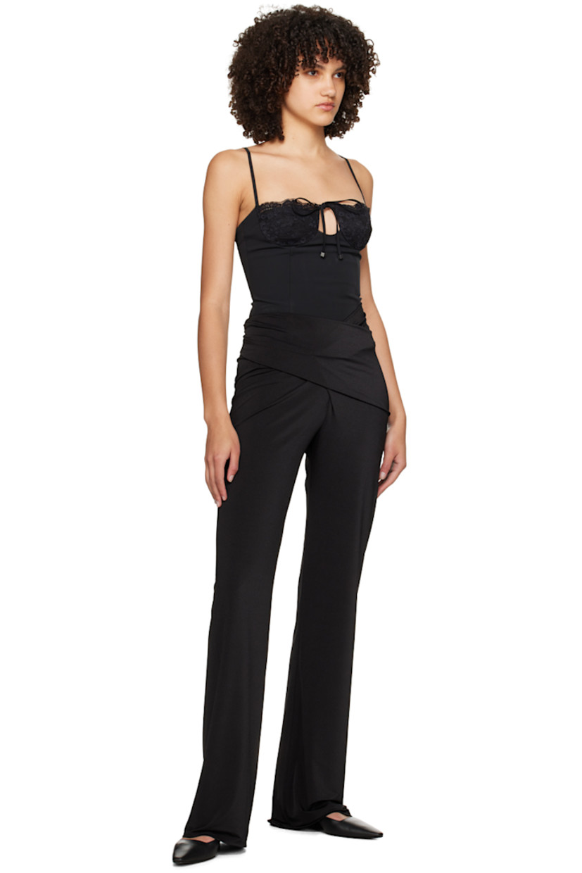 Stretch polyester jersey trousers. 

· Draping, gathering, and twisted detailing at waistband 
· Full jersey lining

Supplier color: Black