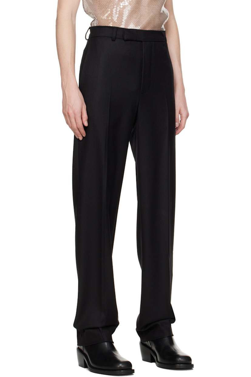 Virgin wool twill trousers.

· Belt loops
· Four-pocket styling
· Button-fly
· Creased legs
· Unlined

Available exclusively at SSENSE.

Supplier color: Black