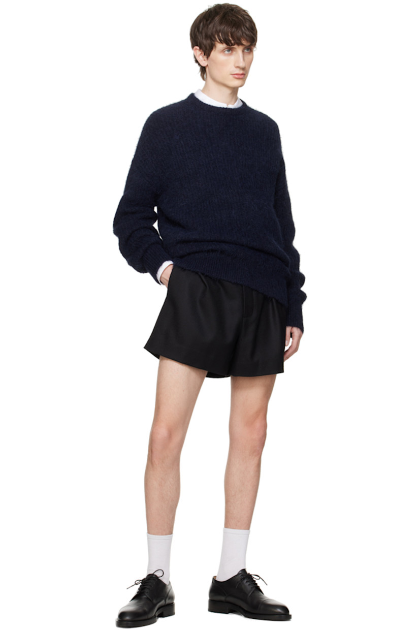 Virgin wool-blend twill shorts.

· Belt loops
· Four-pocket styling
· Button-fly
· Pleats at front
· Unlined

Available exclusively at SSENSE.

Supplier color: Black