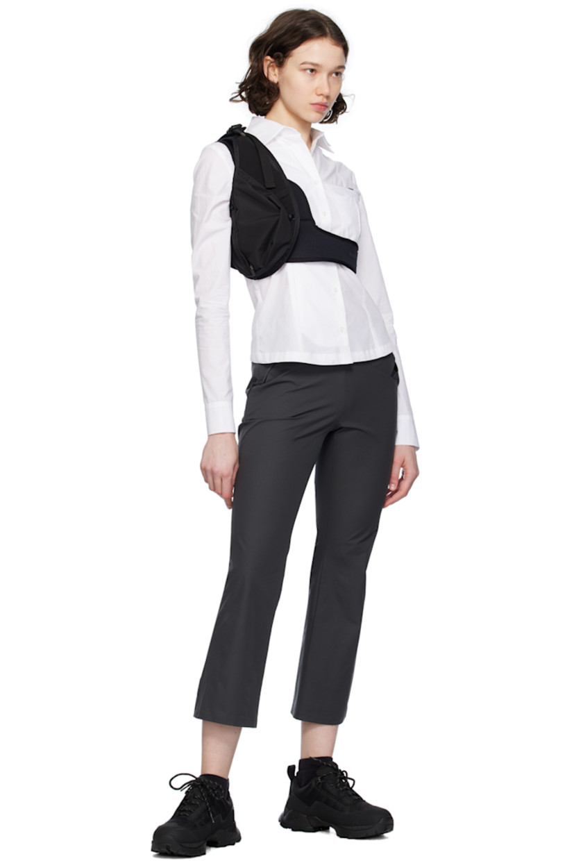 Polyester taffeta trousers.

· Detachable turn-lock belt at waistband
· Single-pocket styling
· Zip pocket at front
· Zip closure at outseam
· Hammer loop at outseam

Supplier color: Charcoal