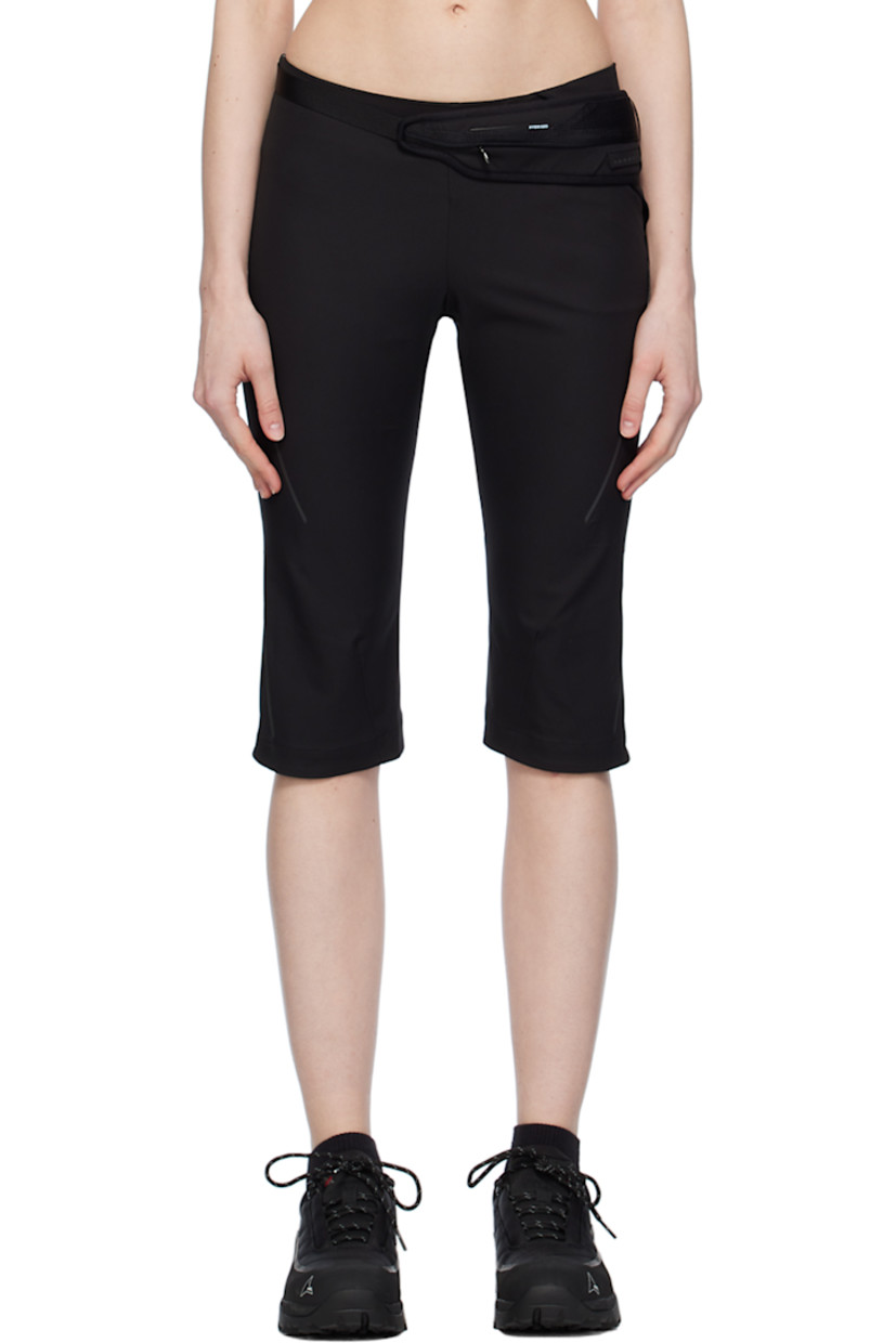 Polyester crepe shorts. Belt-style pouch with zip compartment at waist.

· Two-pocket styling
· Concealed zip closure at outseam
· Rubberized logo patch at outseam
· Reflective trim at outseams

Supplier color: Black