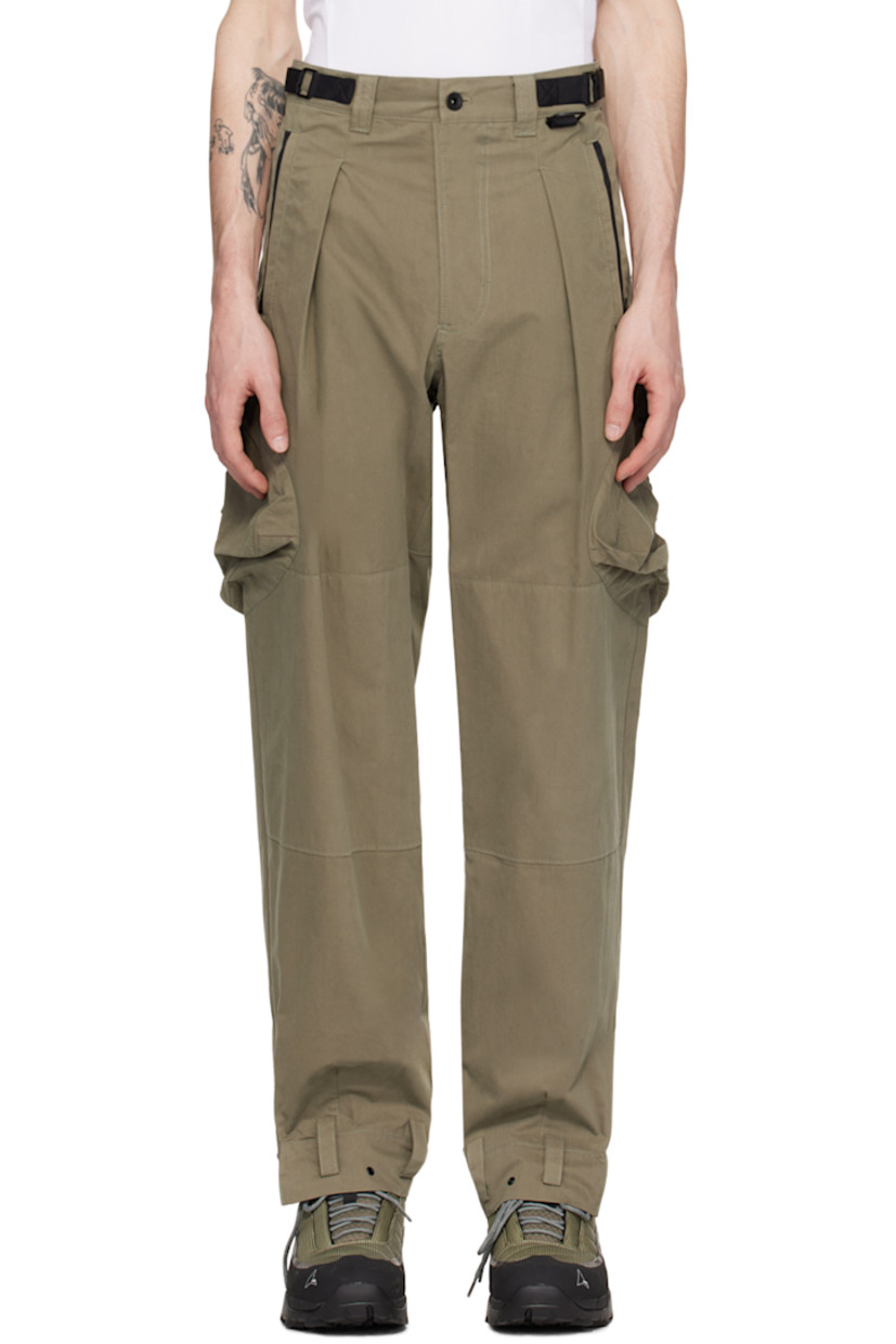 Cotton and nylon-blend peached twill cargo pants.

· Belt loops
· Adjustable velcro tabs at waistband
· Zip closure
· Four-pocket styling
· D-ring and pleats at front
· Loops and press-stud fastening at cuffs 
· Flap pocket at outseams 

Supplier color: Khaki