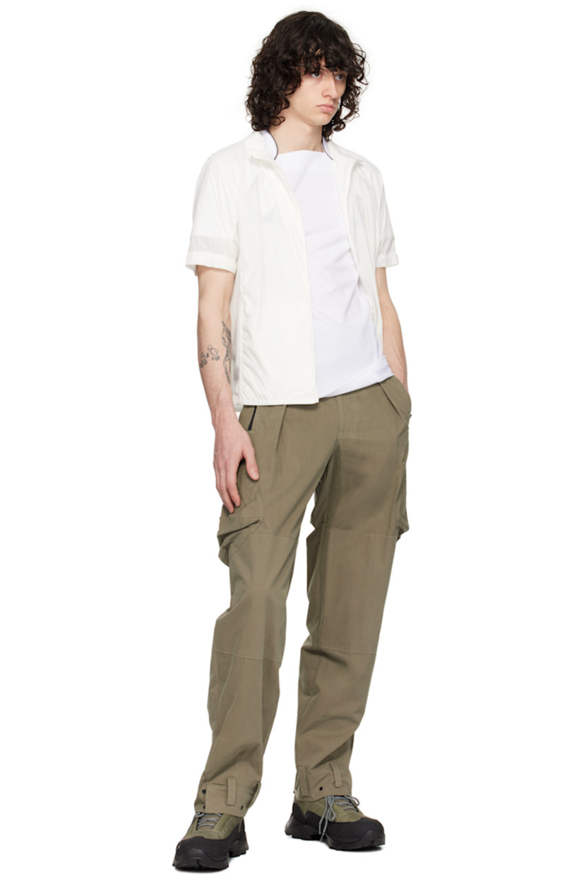 Cotton and nylon-blend peached twill cargo pants.

· Belt loops
· Adjustable velcro tabs at waistband
· Zip closure
· Four-pocket styling
· D-ring and pleats at front
· Loops and press-stud fastening at cuffs 
· Flap pocket at outseams 

Supplier color: Khaki
