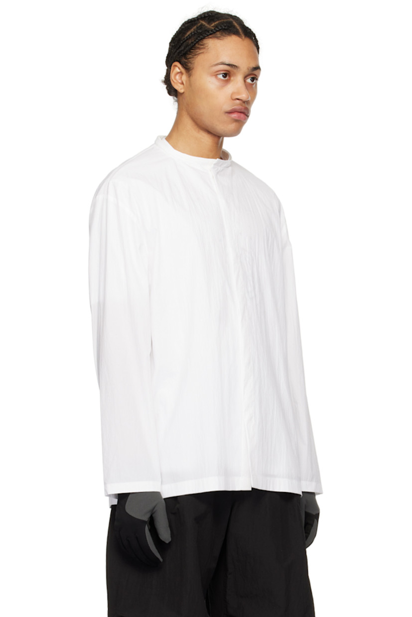 Crinkled cotton-blend poplin shirt.

· Drawstring at detachable hood
· Round neck
· Press-stud closure

Supplier color: White