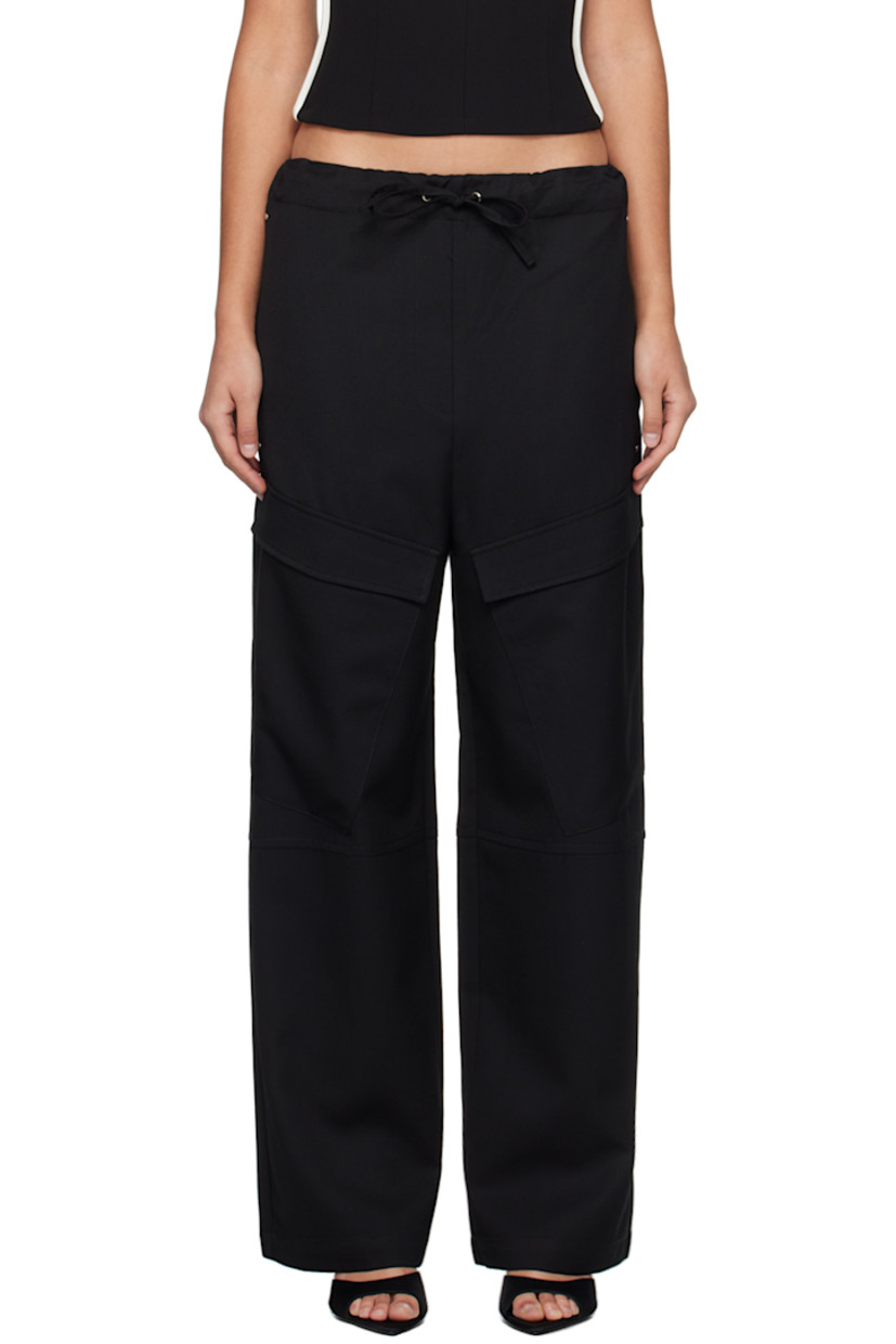 Relaxed-fit wool twill trousers. 

· Paneled construction
· Drawstring at elasticized waistband
· Four-pocket styling
· Flap pockets at front

Supplier color: Black
