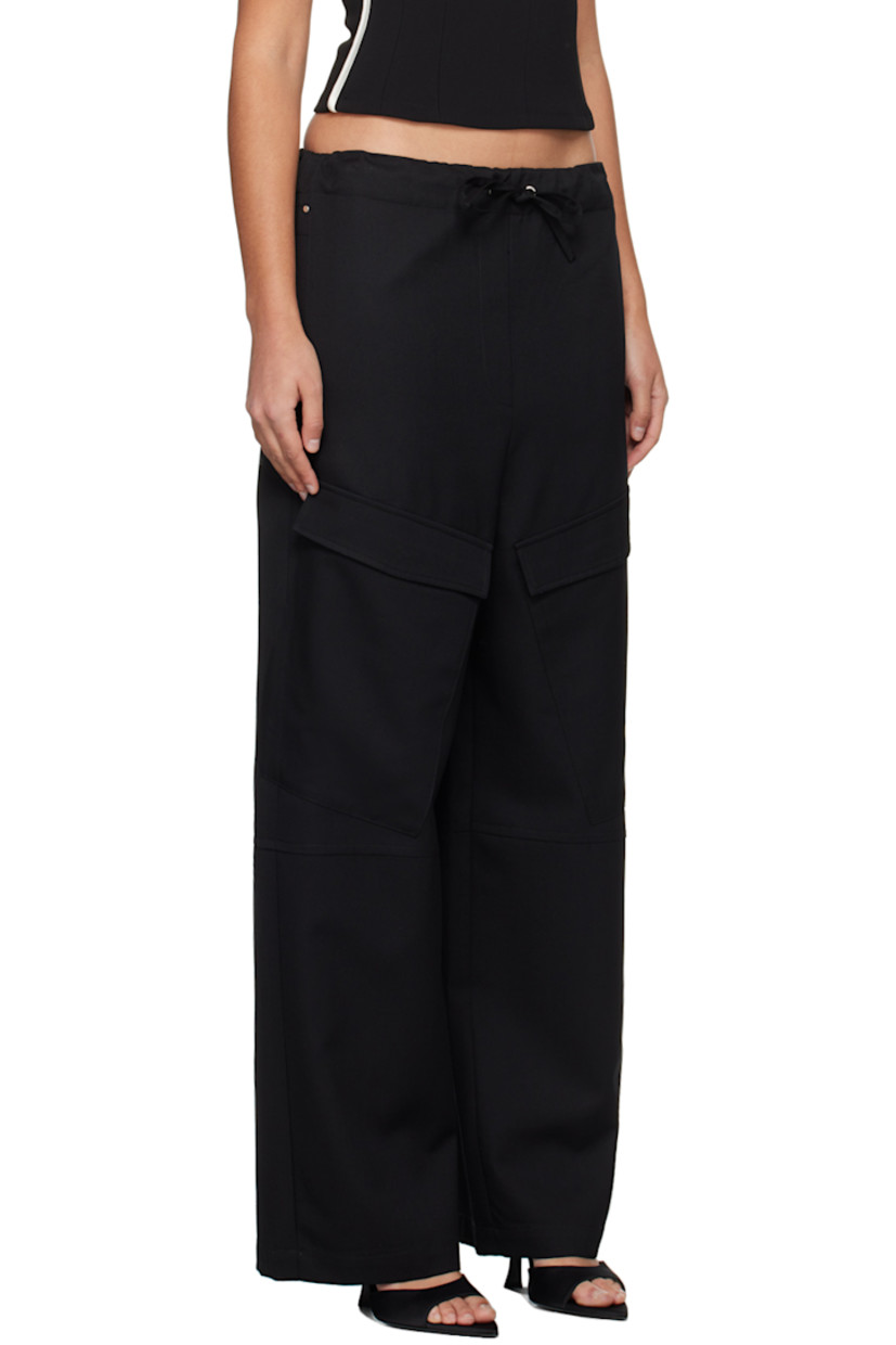 Relaxed-fit wool twill trousers. 

· Paneled construction
· Drawstring at elasticized waistband
· Four-pocket styling
· Flap pockets at front

Supplier color: Black