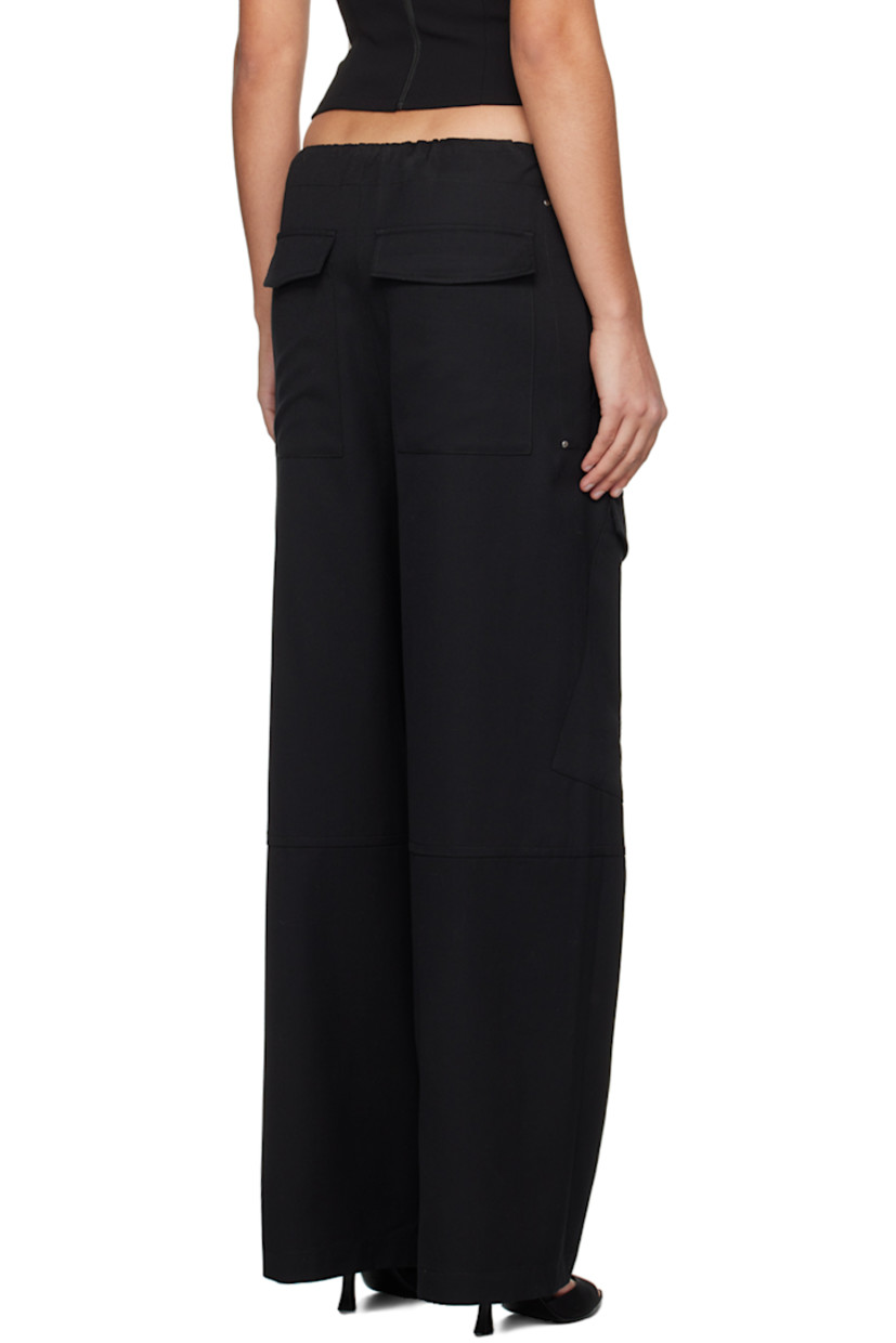 Relaxed-fit wool twill trousers. 

· Paneled construction
· Drawstring at elasticized waistband
· Four-pocket styling
· Flap pockets at front

Supplier color: Black