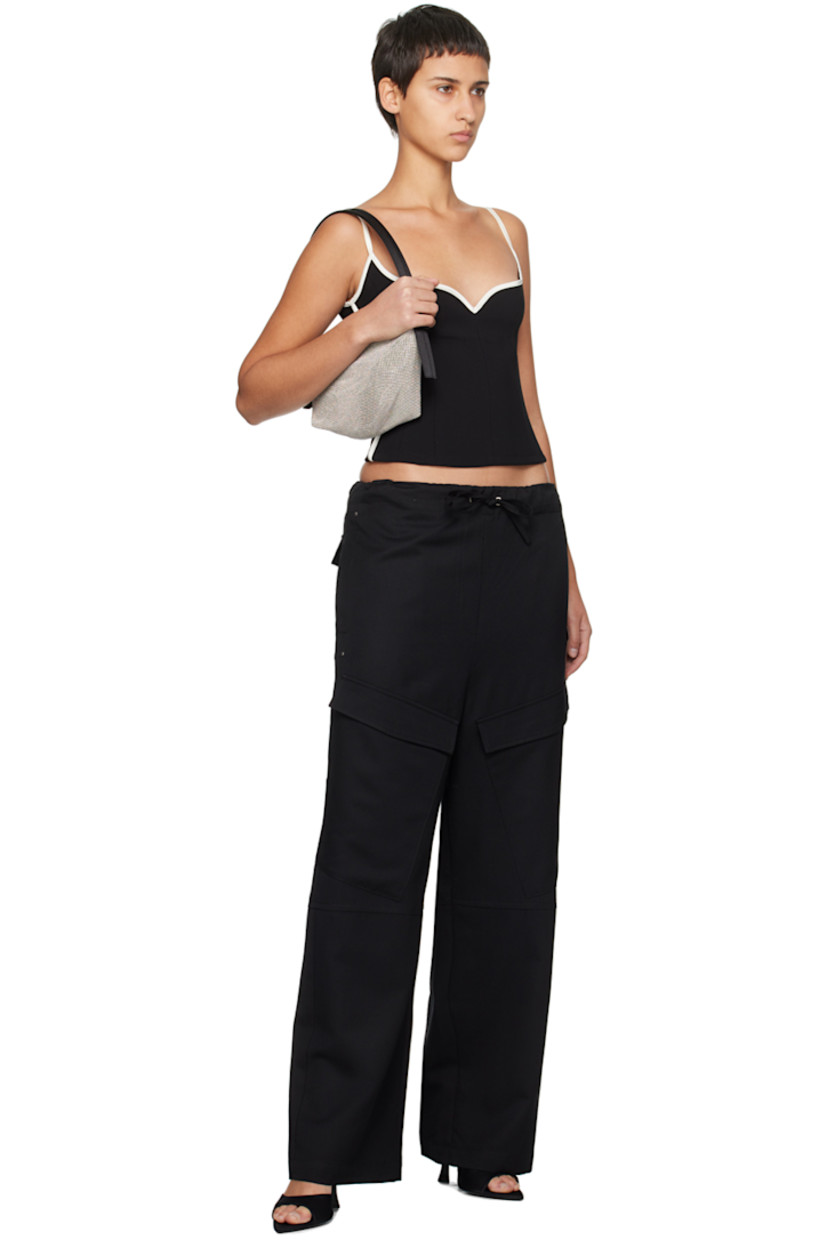 Relaxed-fit wool twill trousers. 

· Paneled construction
· Drawstring at elasticized waistband
· Four-pocket styling
· Flap pockets at front

Supplier color: Black