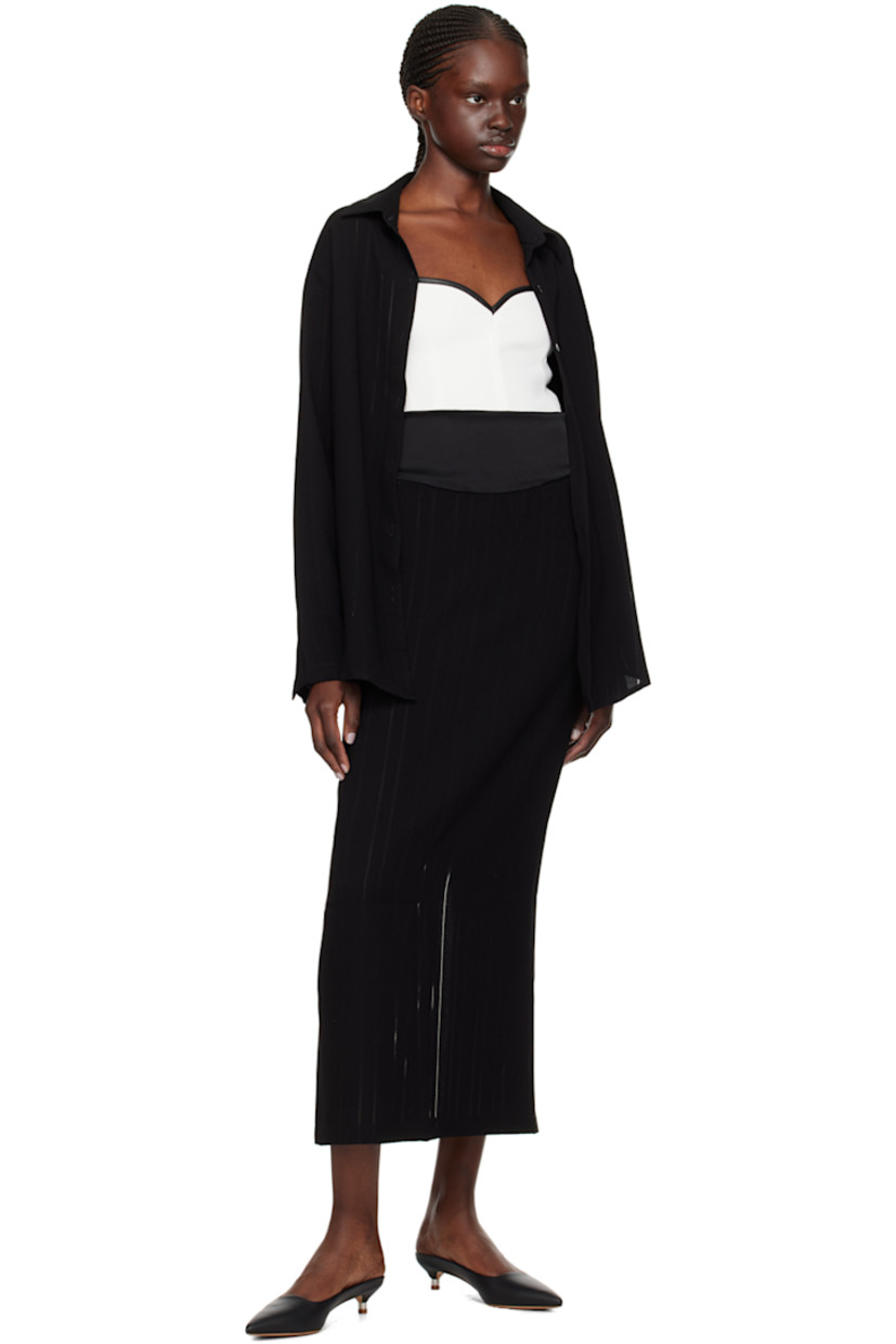 Triacetate- and polyester-blend crepe skirt. Stripes and pointelle detailing throughout.

· Self-tie straps at satin waistband
· Central vent at back hem

Supplier color: Black