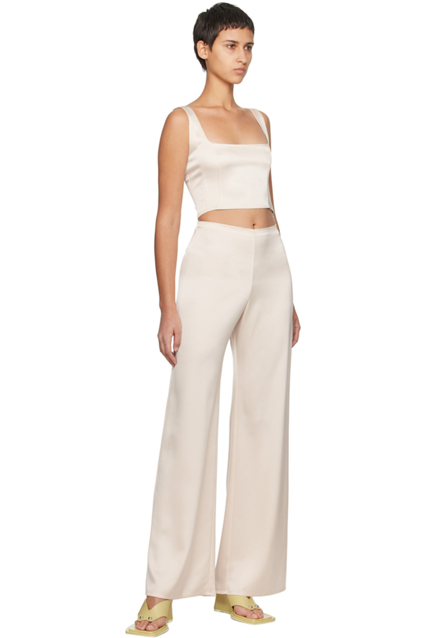 Triacetate-blend sateen tank top. 

· Square neck 
· Darts at front
· Cropped hem 
· Zip closure at side seam
· Fixed shoulder straps

Supplier color: Pearl