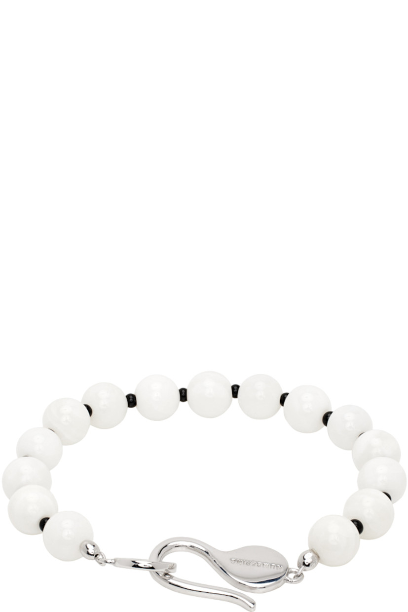 Beaded mother-of-pearl bracelet in white. Logo-engraved rhodium-plated sterling silver hook-eye fastening.

Supplier color: White