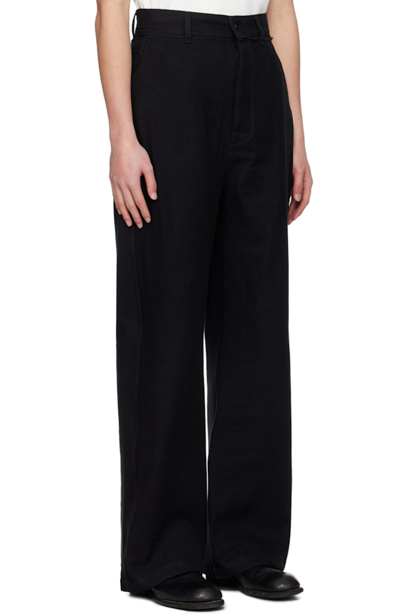 Non-stretch denim jeans. Cotton gauze overlay throughout. 

· Layered construction 
· Belt loops
· Raw edge at waistband
· Concealed four-pocket styling 
· Zip-fly
· Logo embroidered at back waistband 
 
Supplier color: Black