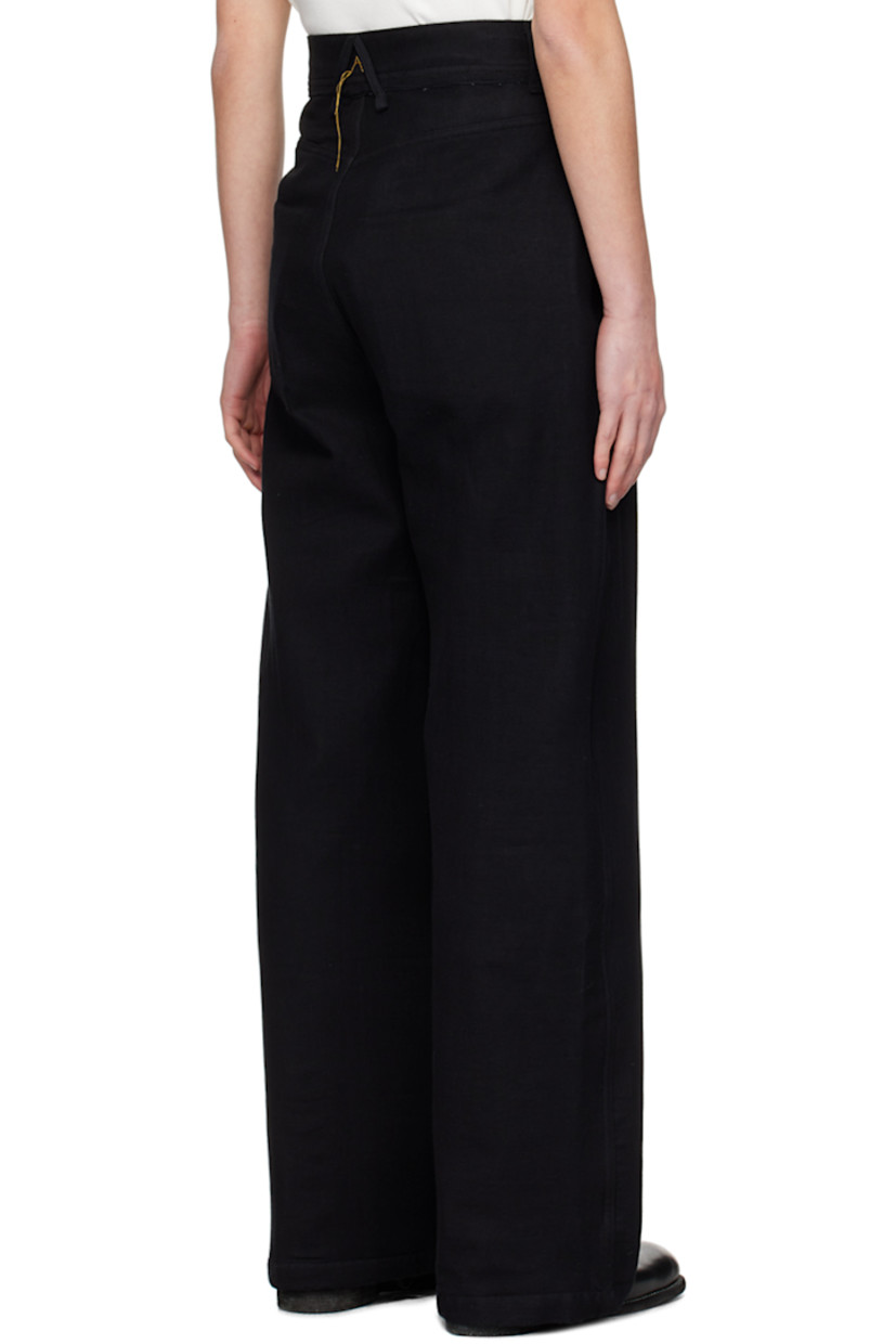Non-stretch denim jeans. Cotton gauze overlay throughout. 

· Layered construction 
· Belt loops
· Raw edge at waistband
· Concealed four-pocket styling 
· Zip-fly
· Logo embroidered at back waistband 
 
Supplier color: Black