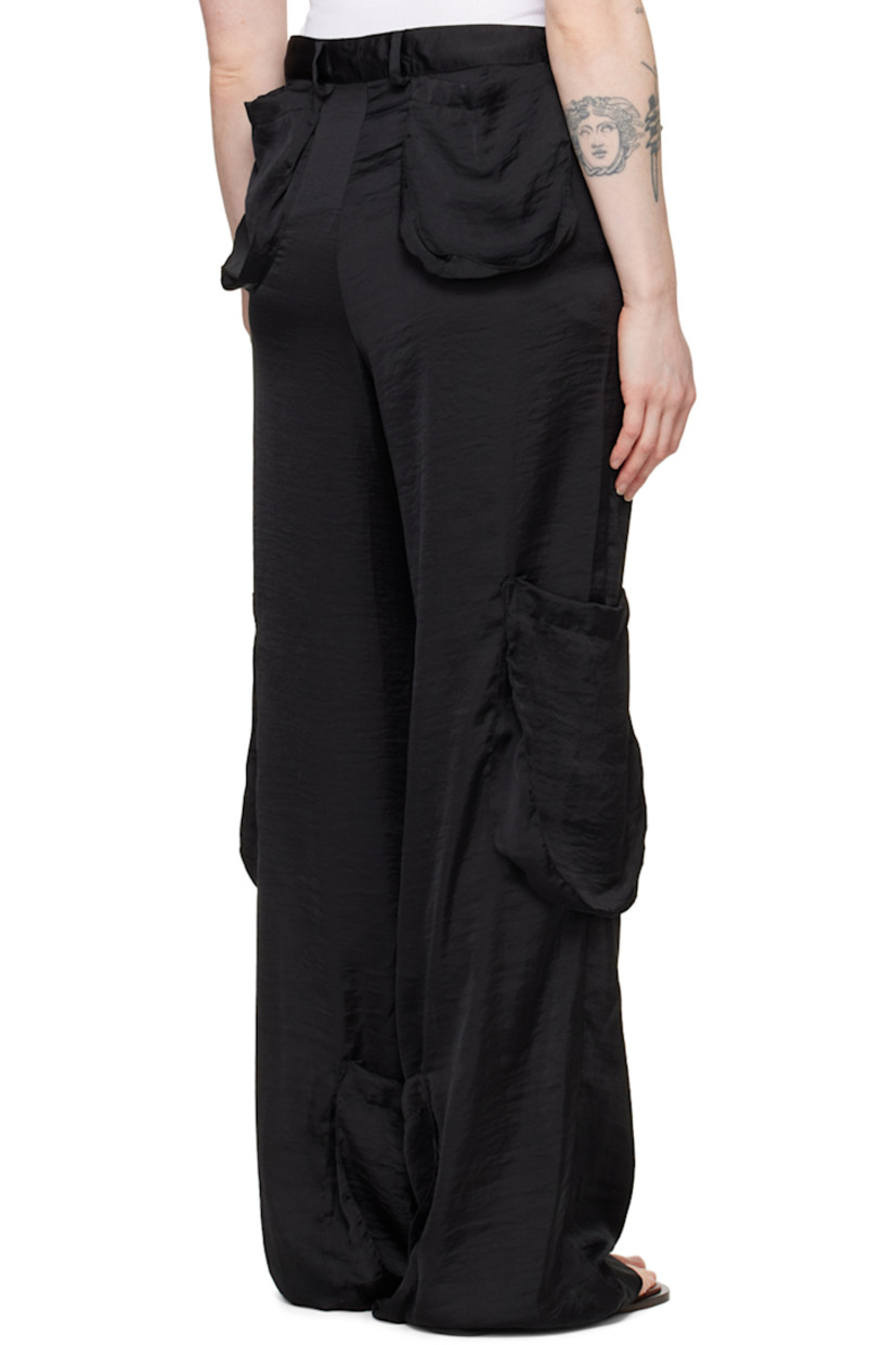 Crinkled polyester satin trousers.

· Belt loops
· Four-pocket styling
· Zip-fly
· Patch pockets at inseams and outseams

Supplier color: Black