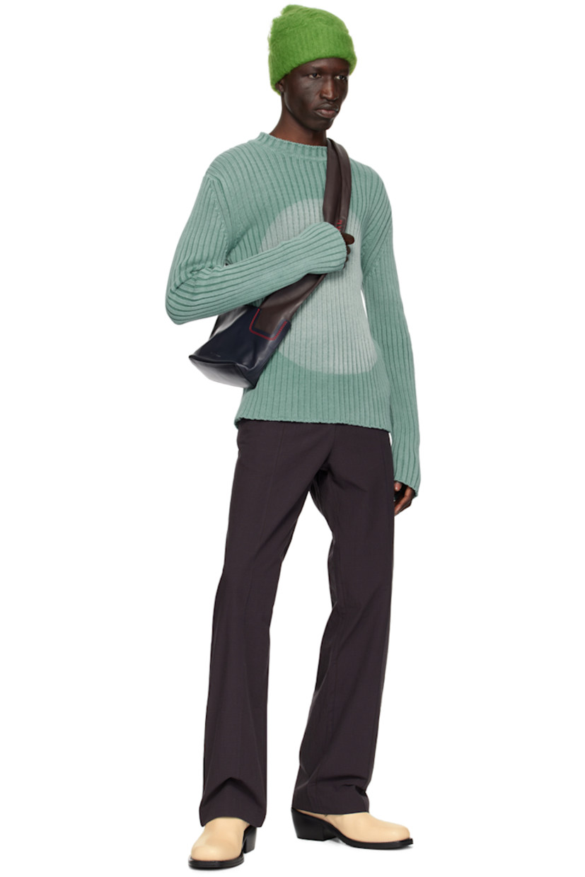 Rib knit cotton sweater. Fading throughout. 

· Crewneck 
· Graphic printed at front 

Supplier color: Washed aqua