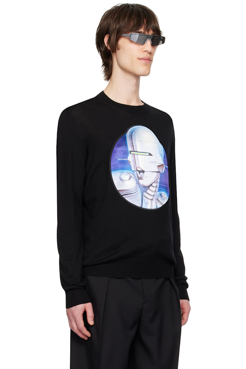 Knit RWS-certified virgin wool sweater. 

· Rib knit crewneck, hem, and cuffs
· Graphic patch embroidered at front
· Logo embroidered at sleeve

Part of the Stella McCartney Sorayama capsule collection.

Made from cruelty-free, non-animal materials.

Supplier color: Black