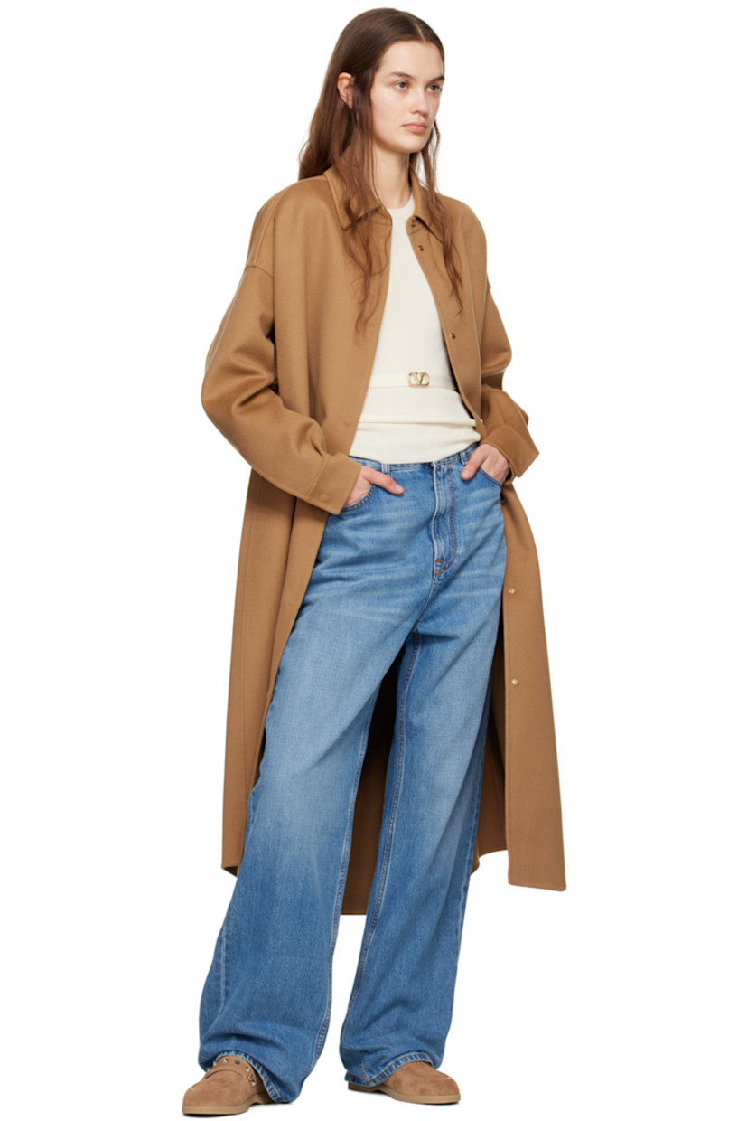 Wool- and cashmere-blend melton coat. 

· Spread collar 
· Concealed press-stud closure 
· Logo hardware at welt pockets 
· Press-stud fastening at cuffs 
· Unlined 
· Gold-tone hardware

Supplier color: Old ginger
