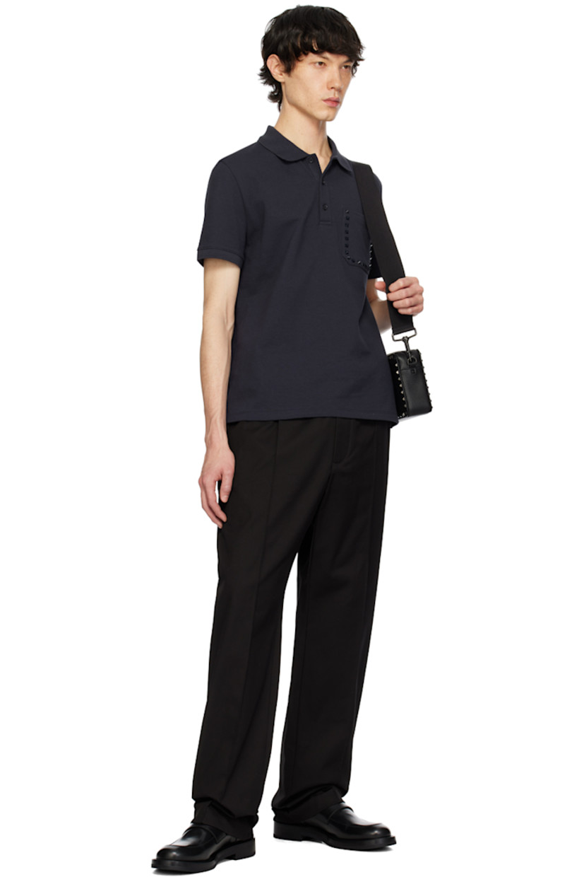 Stretch cotton canvas trousers.

· Concealed drawstring at elasticized waistband
· Four-pocket styling
· Zip-fly
· Pinched seams at front 
· Logo hardware at back pocket
· Central creases at back

Supplier color: Nero