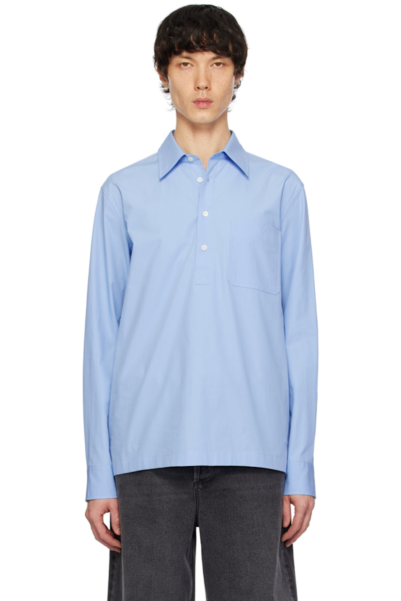 Cotton poplin shirt.

· Spread collar
· Four-button placket
· Logo cutout at patch pocket
· Vented side seams
· Single-button barrel cuffs
· Logo-engraved hardware 

Supplier color: Iris lilac