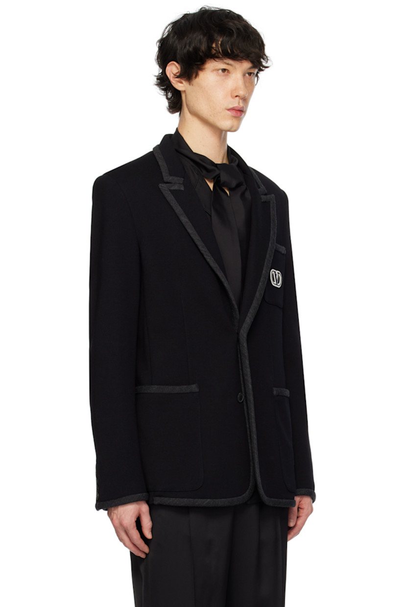 Knit cotton jersey blazer. Rib knit trim throughout.

· Peaked lapel
· Button closure
· Embroidered logo patch at chest
· Patch pockets
· Padded shoulders
· Four-button surgeon's cuffs
· Central vent at back hem
· Partial cupro satin lining
· Logo-engraved black hardware

Supplier color: Navy