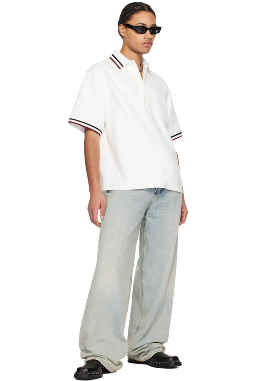 Cotton-blend twill polo. 

· Stripes at spread collar and cuffs
· Three-button closure
· Patch pocket at chest
· Vent at side seams
· Logo hardware at back yoke

Supplier color: Bianco/Nero/Bordeaux