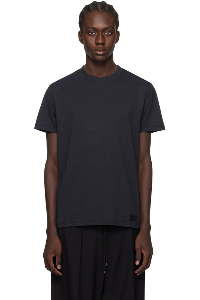Cotton jersey T-Shirt 

· Rib knit crewneck 
· Logo patch at front 

Supplier color: Navy