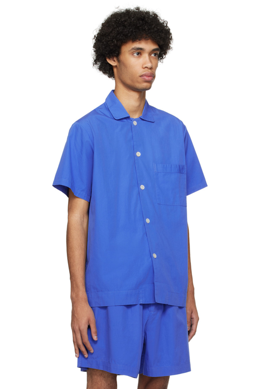 Lightweight OEKO-TEX® Standard 100-certified organic cotton poplin pyjama shirt. 

· Spread collar
· Button closure
· Patch pocket at chest
· Mother-of-pearl hardware

Supplier color: Royal blue