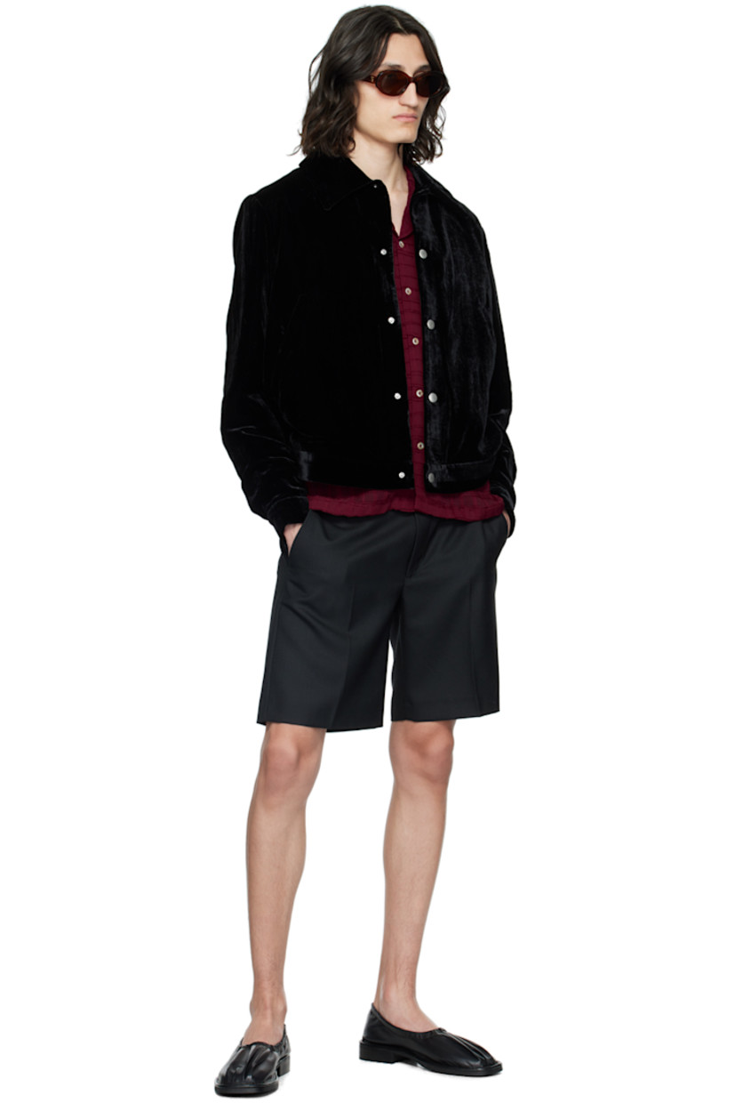 Wide-leg lightweight polyester- and wool-blend twill shorts.

· Belt loops
· Four-pocket styling
· Zip-fly
· Creased legs

Supplier color: Black