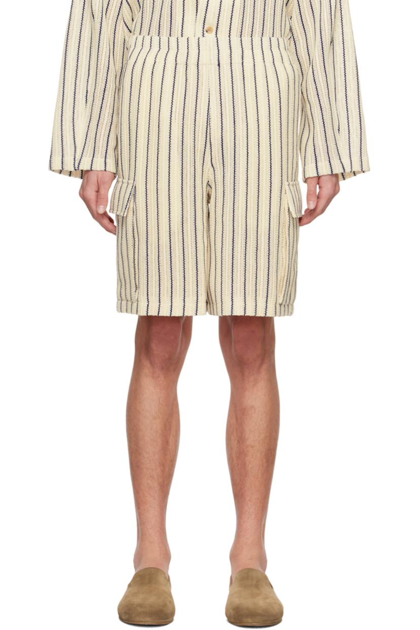 Open knit cotton shorts. Jacquard stripes throughout.  

· Elasticized waistband 
· Two-pocket styling 
· Flap pockets at outseams 
· Full mesh lining

Supplier color: Blue