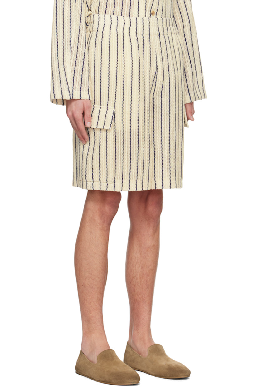 Open knit cotton shorts. Jacquard stripes throughout.  

· Elasticized waistband 
· Two-pocket styling 
· Flap pockets at outseams 
· Full mesh lining

Supplier color: Blue