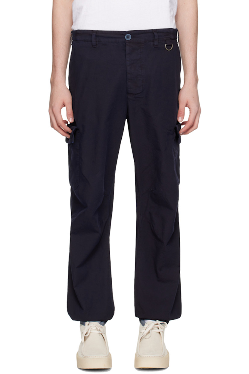 Cotton canvas cargo pants. 

· Belt loops
· Partial rib knit trim at waistband 
· Four-pocket styling 
· Button-fly
· D-ring at front
· Darts at knees
· Partially elasticized cuffs
· Cargo pockets at outseams

Supplier color: Navy