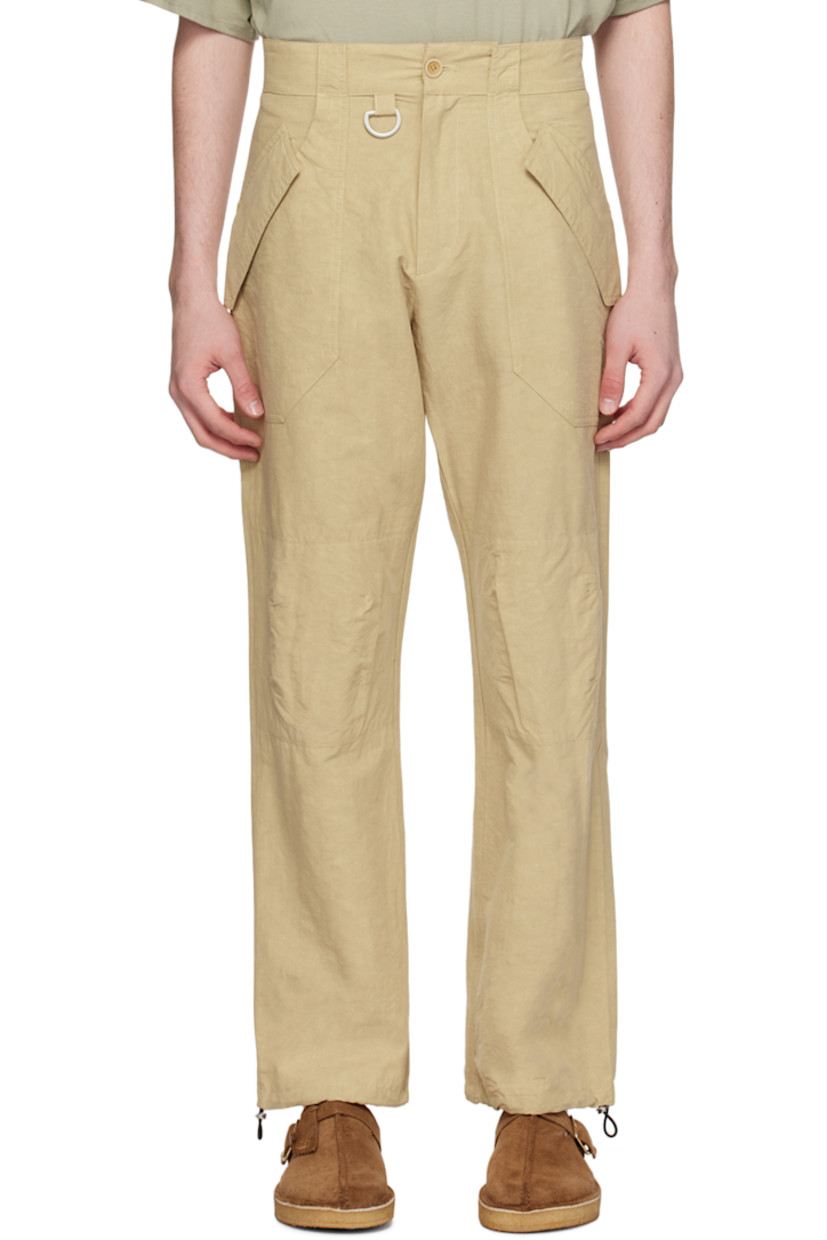 Plain-woven cotton- and linen-blend trousers. 

· Paneled construction
· Belt loops
· Six-pocket styling 
· Zip-fly
· D-ring at front 
· Darts and pleats at knees
· Bungee-style drawstring at cuffs

Supplier color: Beige