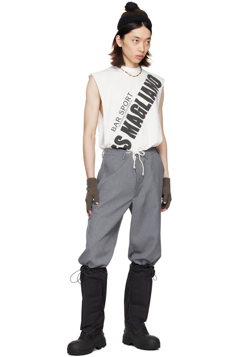 Cotton jersey tank top.

· Extended trim at rib knit crewneck
· Logo and text printed at front
· Rolled edge at dropped armscyes

Supplier color: Merch white