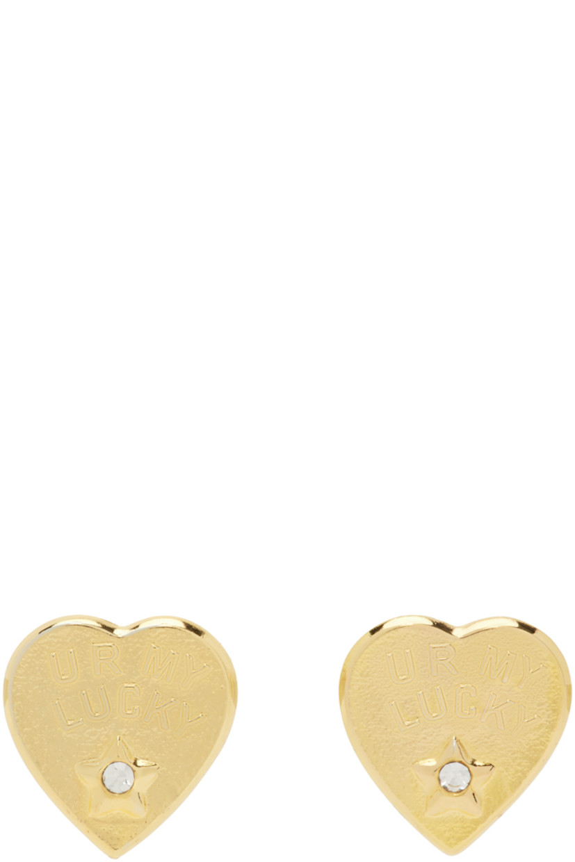 Pair of graphic stud earrings in gold-tone brass.

· Text embossed at face
· Crystal-cut accent at face
· Post-stud fastening
· D0.75" 

Supplier color: Gold