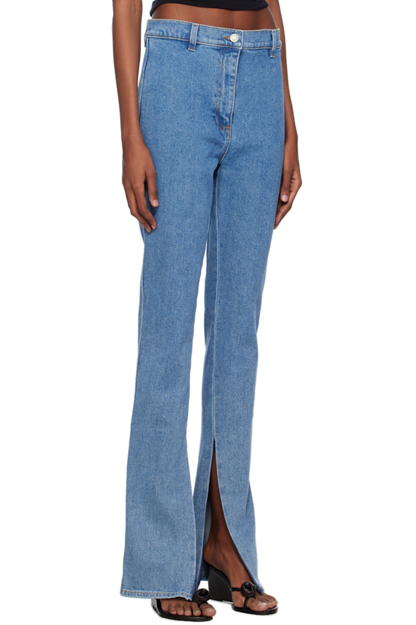 Stretch denim jeans. Fading throughout.

· High-rise
· Belt loops
· Zip-fly
· Zip vent at cuffs
· Logo patch at back waistband

Supplier color: Blue