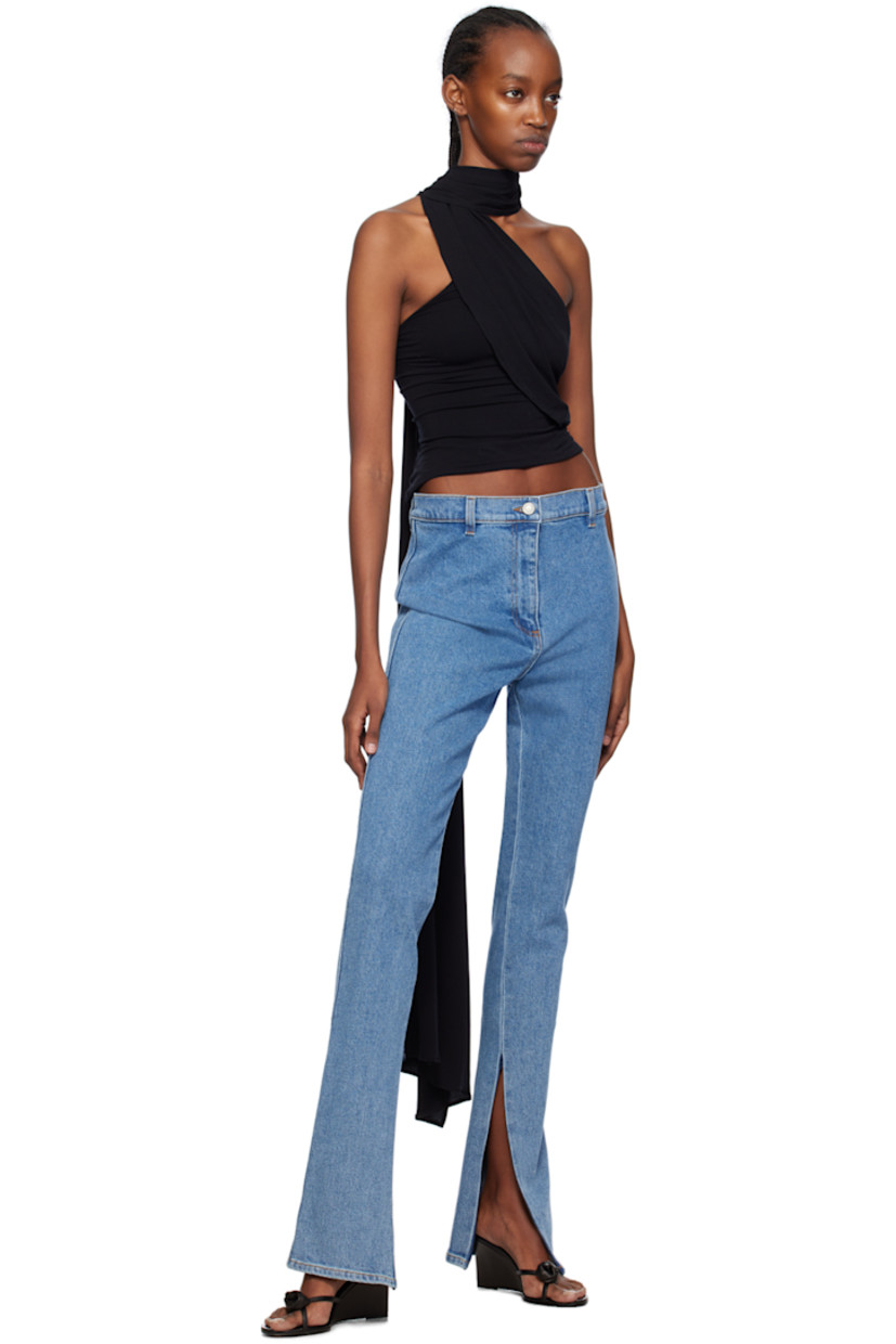 Stretch denim jeans. Fading throughout.

· High-rise
· Belt loops
· Zip-fly
· Zip vent at cuffs
· Logo patch at back waistband

Supplier color: Blue