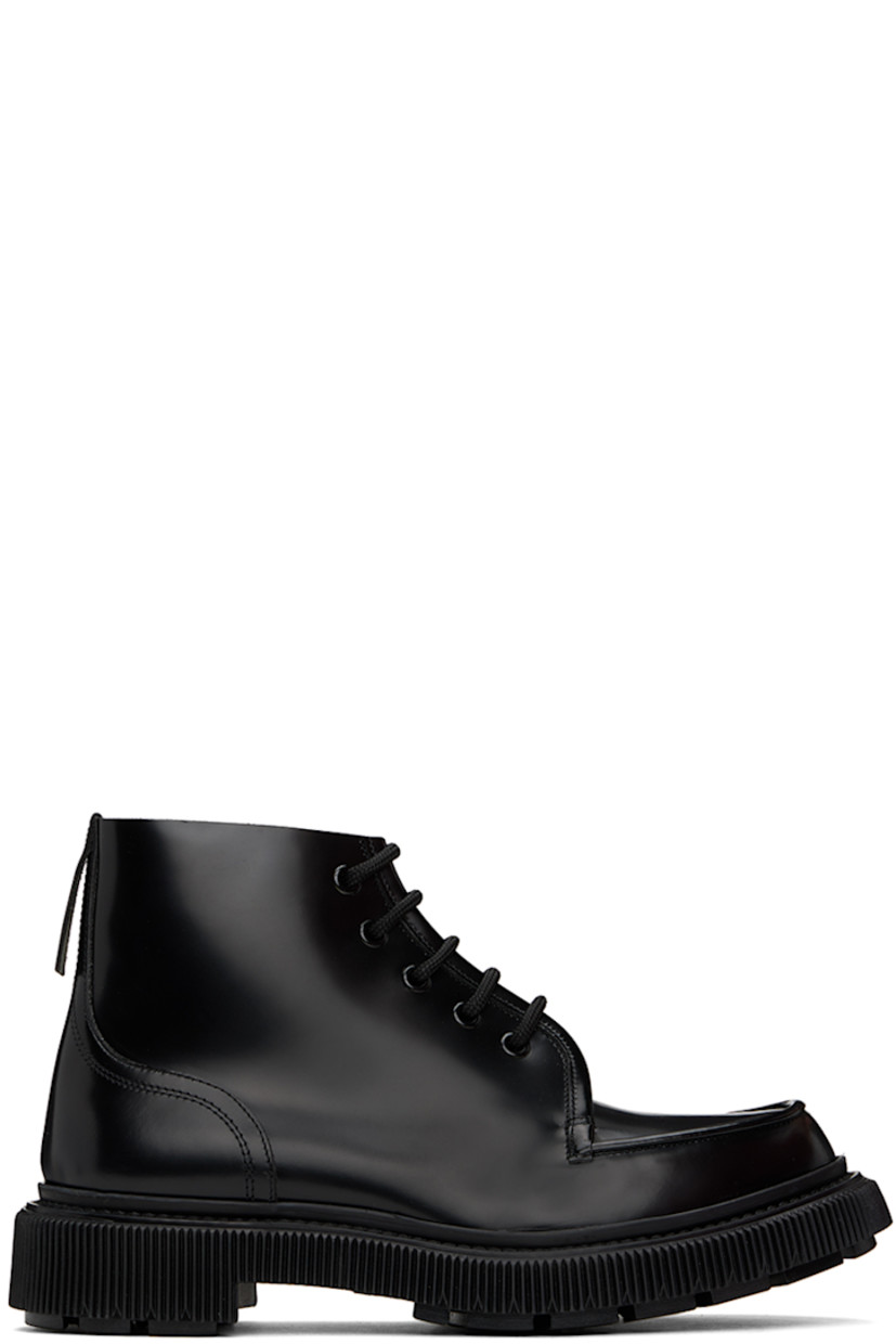 Ankle-high polished leather boots in black.

· Moc toe
· Lace-up closure
· Pull-tab at heel tab
· Suede lining
· Textured rubber midsole
· Treaded rubber sole

Supplier color: Black