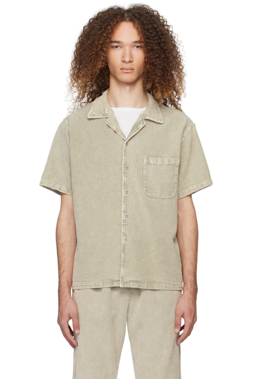 Cotton corduroy shirt. 

· Open spread collar
· Button closure 
· Patch pocket
· Shirttail hem

Supplier color: Citron sage
