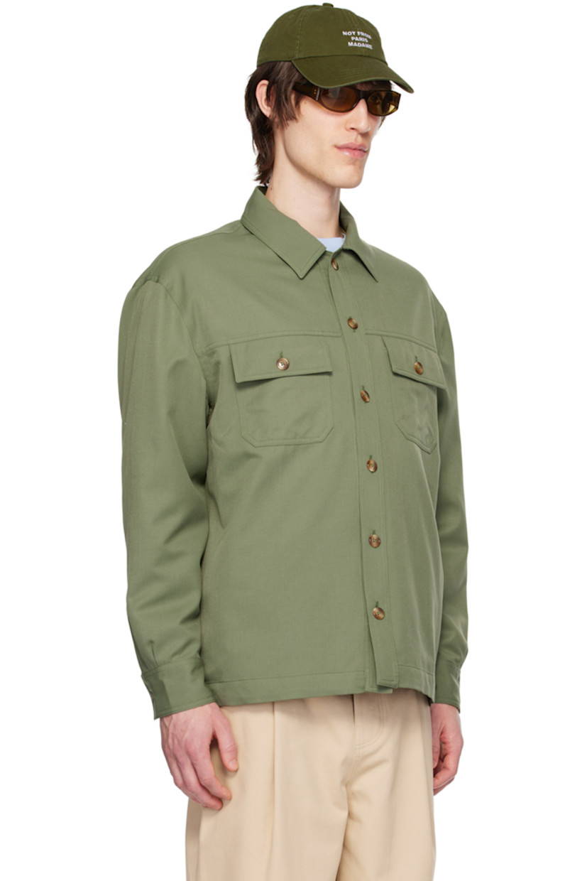 Polyester- and virgin wool-blend twill shirt.

· Spread collar
· Button closure
· Flap pockets
· Single-button barrel cuffs
· Full viscose twill lining

Supplier color: Kaki