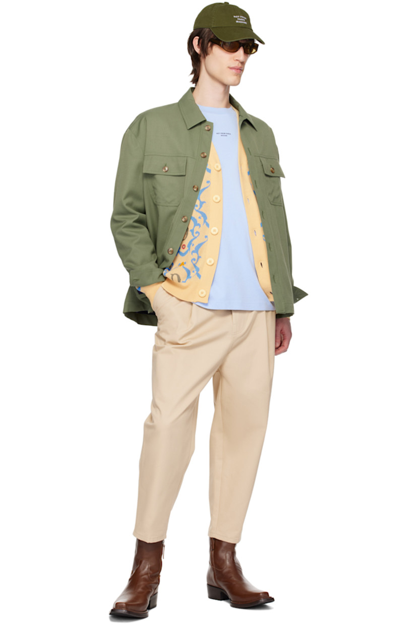 Polyester- and virgin wool-blend twill shirt.

· Spread collar
· Button closure
· Flap pockets
· Single-button barrel cuffs
· Full viscose twill lining

Supplier color: Kaki