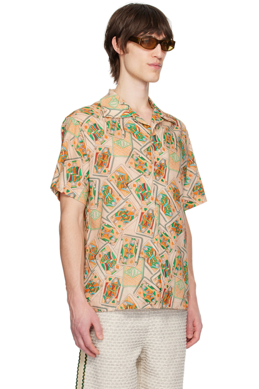 Linen- and cotton-bend hopsack shirt. Graphic pattern printed throughout.

· Open spread collar
· Button closure
· Logo-engraved hardware

Supplier color: Peach