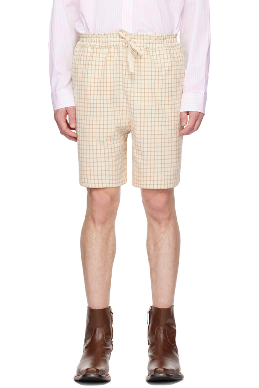 Slub cotton- and silk- blend canvas shorts. Check pattern throughout.

· Drawstring at elasticized waistband
· Three-pocket styling
· Logo patch at back patch pocket

Supplier color: Beige