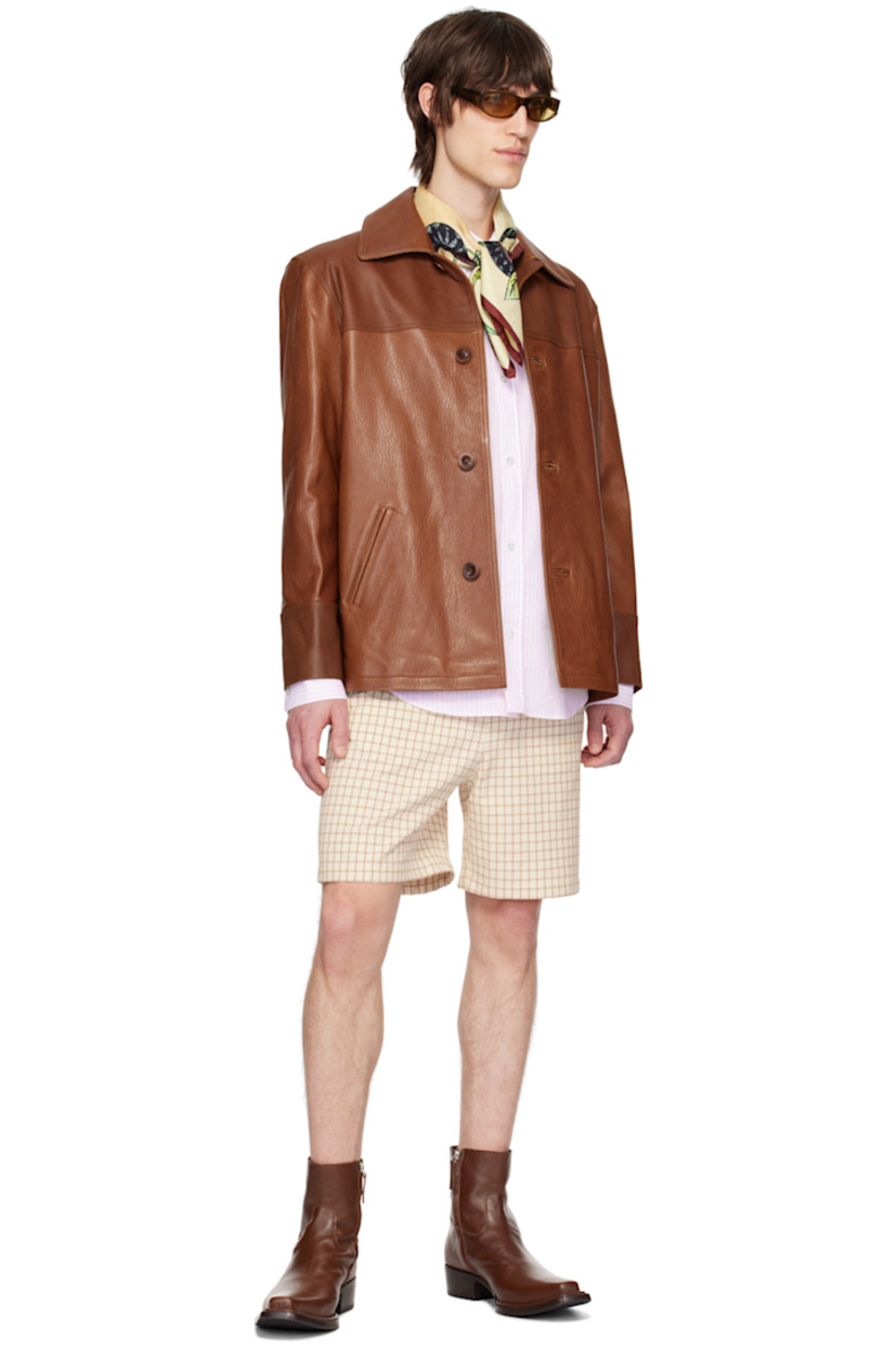 Slub cotton- and silk- blend canvas shorts. Check pattern throughout.

· Drawstring at elasticized waistband
· Three-pocket styling
· Logo patch at back patch pocket

Supplier color: Beige