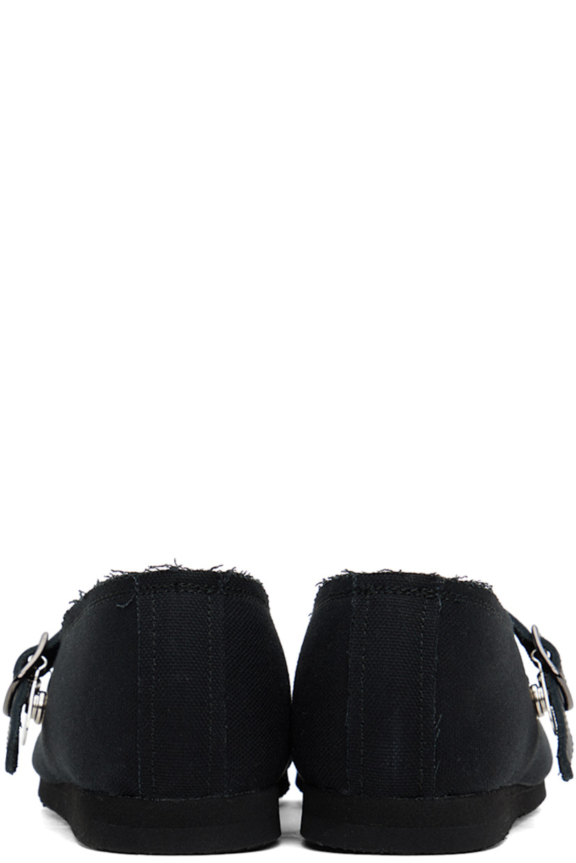 Lightweight cotton canvas Mary Jane-style ballerina flats in black.

· Raw edges throughout
· Adjustable leather strap at vamp
· Canvas lining
· Foam rubber midsole
· Treaded rubber sole

Supplier color: Black