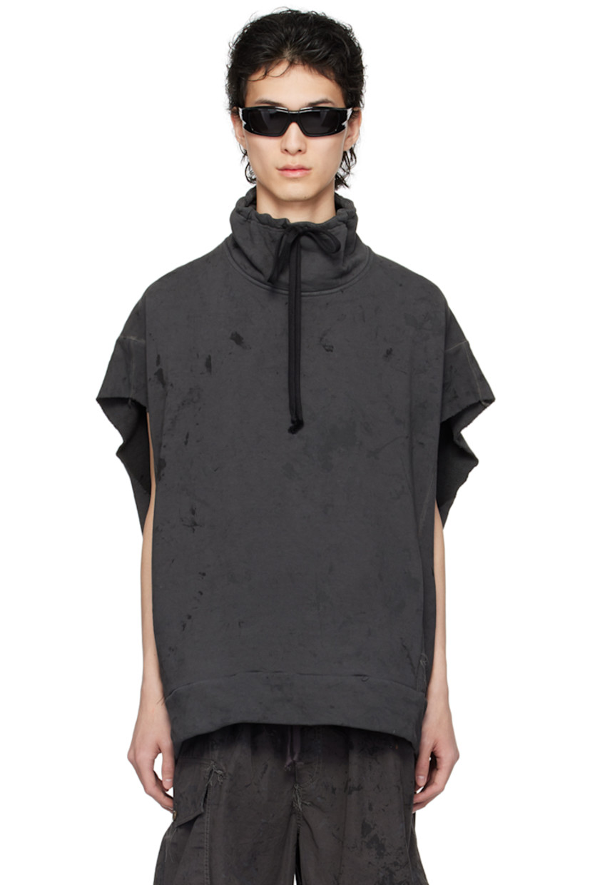 Handcrafted French terry sweatshirt. Graphic pattern printed and loose-thread detailing throughout.

· Paneled construction
· Drawstring at funnel neck
· Welt pockets
· Rib knit hem
· Raw edge at cap sleeves
· Dropped armscyes
· Contrast overlock stitching in gray

Available exclusively at SSENSE.

Supplier color: Urban camo