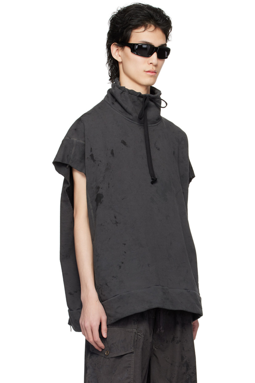 Handcrafted French terry sweatshirt. Graphic pattern printed and loose-thread detailing throughout.

· Paneled construction
· Drawstring at funnel neck
· Welt pockets
· Rib knit hem
· Raw edge at cap sleeves
· Dropped armscyes
· Contrast overlock stitching in gray

Available exclusively at SSENSE.

Supplier color: Urban camo