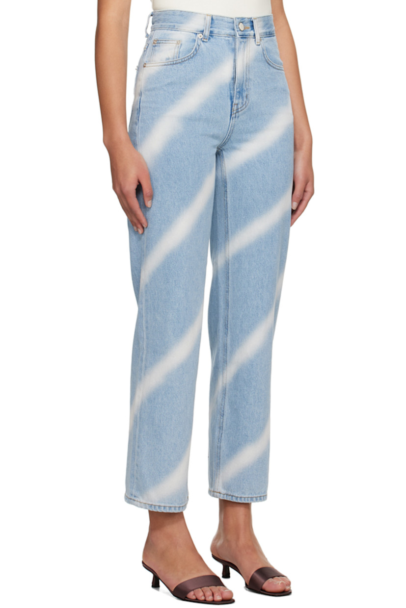 Non-stretch denim jeans. Fading and stripes throughout.

· Belt loops
· Five-pocket styling
· Zip-fly
· Logo embroidered at front
· Logo patch at back waist
· Contrast stitching in tan

Supplier color: Light blue