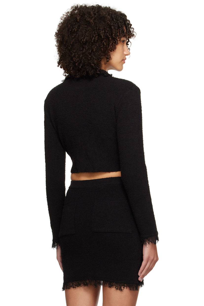 Brushed rib knit cotton-blend sweater. Frayed edges throughout.

· Spread collar
· Two-way zip closure
· Crocheted graphic appliqué at chest
· Patch pockets

Supplier color: Black