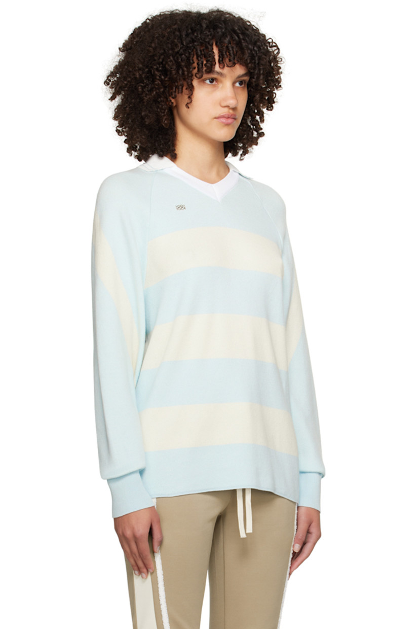 Knit cotton polo. Jacquard stripes throughout.

· Spread collar at rib knit V-neck
· Logo hardware at chest
· Raglan sleeves
· Rib knit cuffs

Supplier color: Sky blue/Cream